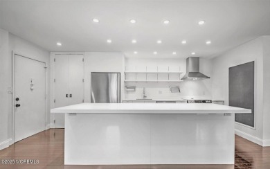 Experience modern elegance in this stunning top-floor condo on Pine Brook Golf Course in New Jersey - for sale on GolfHomes.com, golf home, golf lot