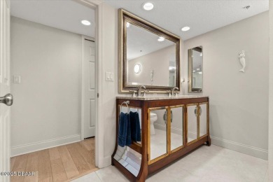 Discover coastal luxury living at its finest in this stunning on Oceans Golf Club in Florida - for sale on GolfHomes.com, golf home, golf lot