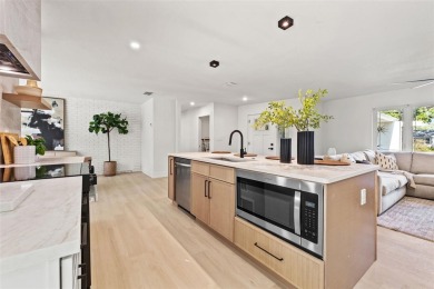 Beautifully renovated, this 3 bed, 2 bath home has over 1,600 on Countryside Country Club in Florida - for sale on GolfHomes.com, golf home, golf lot
