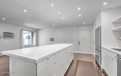 Experience modern elegance in this stunning top-floor condo on Pine Brook Golf Course in New Jersey - for sale on GolfHomes.com, golf home, golf lot