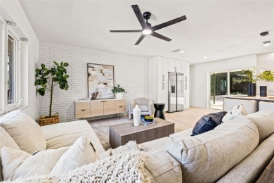Beautifully renovated, this 3 bed, 2 bath home has over 1,600 on Countryside Country Club in Florida - for sale on GolfHomes.com, golf home, golf lot