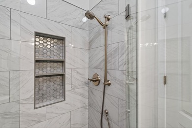 First floor show-stopper style at 315 Troon Court! This bright on Bay Creek Golf Club in Virginia - for sale on GolfHomes.com, golf home, golf lot