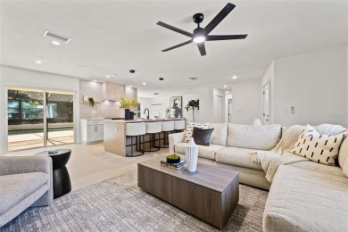 Beautifully renovated, this 3 bed, 2 bath home has over 1,600 on Countryside Country Club in Florida - for sale on GolfHomes.com, golf home, golf lot