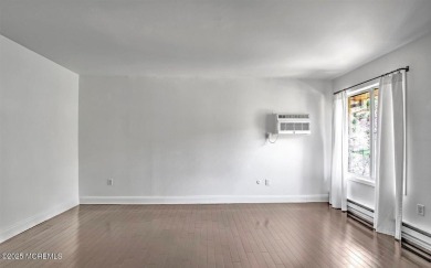 Experience modern elegance in this stunning top-floor condo on Pine Brook Golf Course in New Jersey - for sale on GolfHomes.com, golf home, golf lot