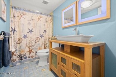 Discover coastal luxury living at its finest in this stunning on Oceans Golf Club in Florida - for sale on GolfHomes.com, golf home, golf lot