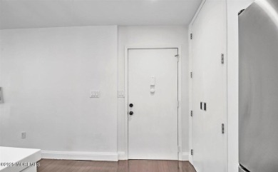 Experience modern elegance in this stunning top-floor condo on Pine Brook Golf Course in New Jersey - for sale on GolfHomes.com, golf home, golf lot