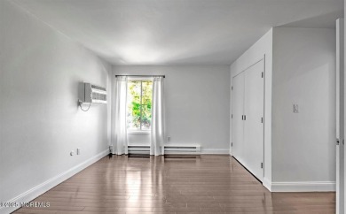 Experience modern elegance in this stunning top-floor condo on Pine Brook Golf Course in New Jersey - for sale on GolfHomes.com, golf home, golf lot