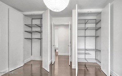 Experience modern elegance in this stunning top-floor condo on Pine Brook Golf Course in New Jersey - for sale on GolfHomes.com, golf home, golf lot