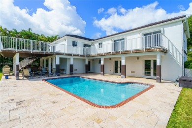 Welcome to your dream home in the heart of Coral Gables! This on Deering Bay Yacht and Country Club in Florida - for sale on GolfHomes.com, golf home, golf lot