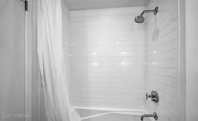 Experience modern elegance in this stunning top-floor condo on Pine Brook Golf Course in New Jersey - for sale on GolfHomes.com, golf home, golf lot