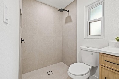 Beautifully renovated, this 3 bed, 2 bath home has over 1,600 on Countryside Country Club in Florida - for sale on GolfHomes.com, golf home, golf lot