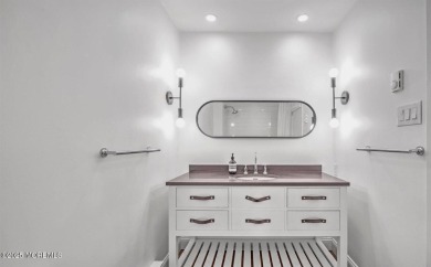Experience modern elegance in this stunning top-floor condo on Pine Brook Golf Course in New Jersey - for sale on GolfHomes.com, golf home, golf lot