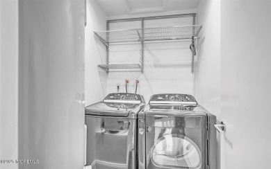 Experience modern elegance in this stunning top-floor condo on Pine Brook Golf Course in New Jersey - for sale on GolfHomes.com, golf home, golf lot