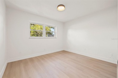 Beautifully renovated, this 3 bed, 2 bath home has over 1,600 on Countryside Country Club in Florida - for sale on GolfHomes.com, golf home, golf lot