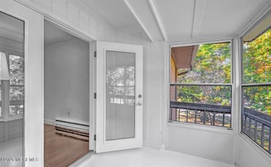 Experience modern elegance in this stunning top-floor condo on Pine Brook Golf Course in New Jersey - for sale on GolfHomes.com, golf home, golf lot