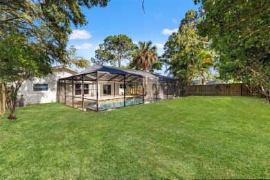 Beautifully renovated, this 3 bed, 2 bath home has over 1,600 on Countryside Country Club in Florida - for sale on GolfHomes.com, golf home, golf lot