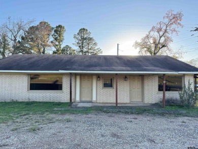 Discover a versatile opportunity with this charming commercial for sale on GolfHomes.com