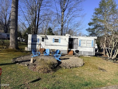 Perfectly landscaped large corner RV lot with both shade trees on Bent Creek Golf Course in Tennessee - for sale on GolfHomes.com, golf home, golf lot