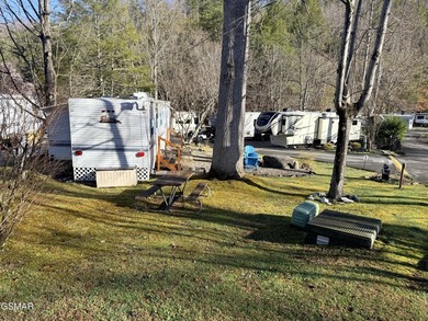 Perfectly landscaped large corner RV lot with both shade trees on Bent Creek Golf Course in Tennessee - for sale on GolfHomes.com, golf home, golf lot