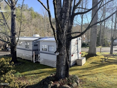 Perfectly landscaped large corner RV lot with both shade trees on Bent Creek Golf Course in Tennessee - for sale on GolfHomes.com, golf home, golf lot