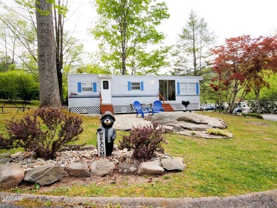 Perfectly landscaped large corner RV lot with both shade trees on Bent Creek Golf Course in Tennessee - for sale on GolfHomes.com, golf home, golf lot