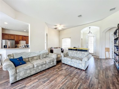 Charming 3-bedroom, 2-bathroom plus den home located in the on Harbor Hills Country Club in Florida - for sale on GolfHomes.com, golf home, golf lot