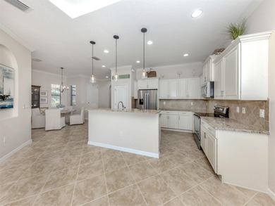 This meticulously maintained, WCI-built residence nestled in the on Sarasota National Golf Club in Florida - for sale on GolfHomes.com, golf home, golf lot