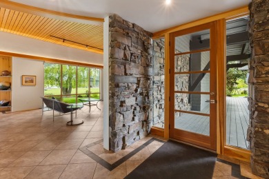 Experience waterfront luxury  mountain serenity in this on Eagle Bend Golf Course in Montana - for sale on GolfHomes.com, golf home, golf lot