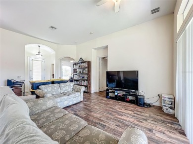 Charming 3-bedroom, 2-bathroom plus den home located in the on Harbor Hills Country Club in Florida - for sale on GolfHomes.com, golf home, golf lot