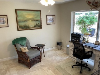 BEAUTIFULLY RENOVATED HURRICANE IMPACT WINDOWS NEW TRAVERTINE on Plantation Golf and Country Club in Florida - for sale on GolfHomes.com, golf home, golf lot