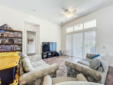 Charming 3-bedroom, 2-bathroom plus den home located in the on Harbor Hills Country Club in Florida - for sale on GolfHomes.com, golf home, golf lot