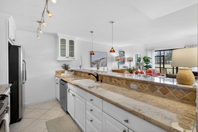 Set on the world-famous PGA Fazio course, this spacious on PGA National Golf Club in Florida - for sale on GolfHomes.com, golf home, golf lot