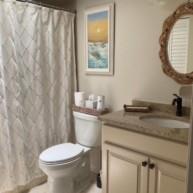 BEAUTIFULLY RENOVATED HURRICANE IMPACT WINDOWS NEW TRAVERTINE on Plantation Golf and Country Club in Florida - for sale on GolfHomes.com, golf home, golf lot