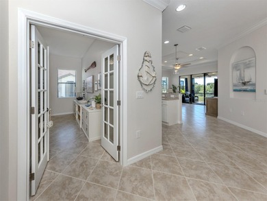 This meticulously maintained, WCI-built residence nestled in the on Sarasota National Golf Club in Florida - for sale on GolfHomes.com, golf home, golf lot