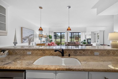 Set on the world-famous PGA Fazio course, this spacious on PGA National Golf Club in Florida - for sale on GolfHomes.com, golf home, golf lot