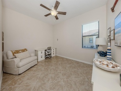This meticulously maintained, WCI-built residence nestled in the on Sarasota National Golf Club in Florida - for sale on GolfHomes.com, golf home, golf lot