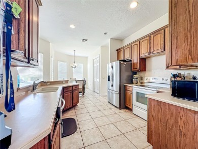 Charming 3-bedroom, 2-bathroom plus den home located in the on Harbor Hills Country Club in Florida - for sale on GolfHomes.com, golf home, golf lot