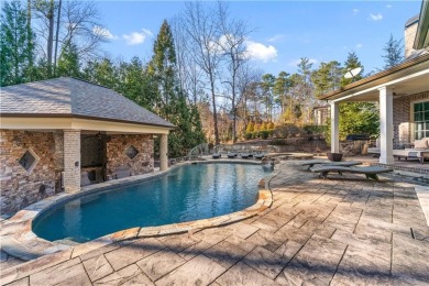 TPC SUGARLOAF SHOWSTOPPER - RARE MAIN-LEVEL WALKOUT TO A PRIVATE on TPC At Sugarloaf Golf Club in Georgia - for sale on GolfHomes.com, golf home, golf lot