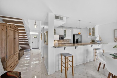 Set on the world-famous PGA Fazio course, this spacious on PGA National Golf Club in Florida - for sale on GolfHomes.com, golf home, golf lot