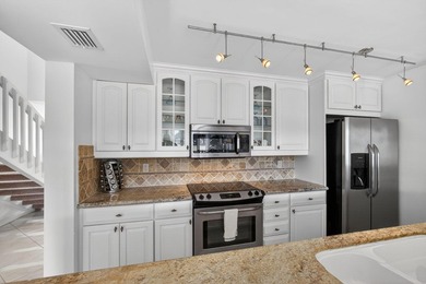 Set on the world-famous PGA Fazio course, this spacious on PGA National Golf Club in Florida - for sale on GolfHomes.com, golf home, golf lot