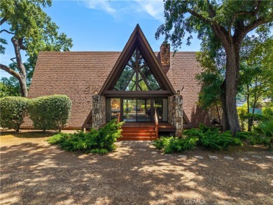Step back in time with this iconic 1970s custom A-frame lake on Buckingham Golf and Country Club in California - for sale on GolfHomes.com, golf home, golf lot
