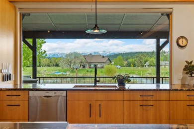 Experience waterfront luxury  mountain serenity in this on Eagle Bend Golf Course in Montana - for sale on GolfHomes.com, golf home, golf lot