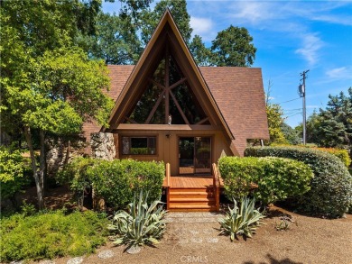 Step back in time with this iconic 1970s custom A-frame lake on Buckingham Golf and Country Club in California - for sale on GolfHomes.com, golf home, golf lot