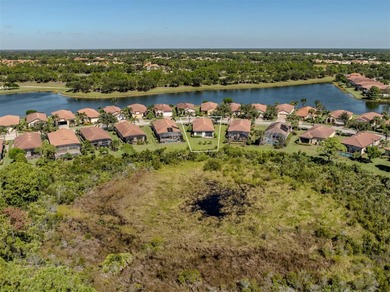 This meticulously maintained, WCI-built residence nestled in the on Sarasota National Golf Club in Florida - for sale on GolfHomes.com, golf home, golf lot