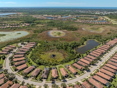 This meticulously maintained, WCI-built residence nestled in the on Sarasota National Golf Club in Florida - for sale on GolfHomes.com, golf home, golf lot