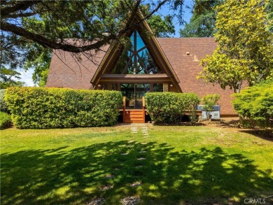 Step back in time with this iconic 1970s custom A-frame lake on Buckingham Golf and Country Club in California - for sale on GolfHomes.com, golf home, golf lot