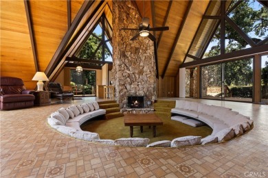 Step back in time with this iconic 1970s custom A-frame lake on Buckingham Golf and Country Club in California - for sale on GolfHomes.com, golf home, golf lot
