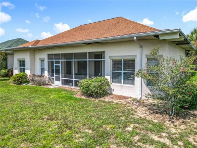Charming 3-bedroom, 2-bathroom plus den home located in the on Harbor Hills Country Club in Florida - for sale on GolfHomes.com, golf home, golf lot