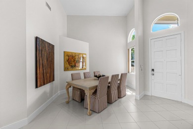 Welcome to this charming single-story townhome, where modern on Boca Delray Golf and Country Club in Florida - for sale on GolfHomes.com, golf home, golf lot
