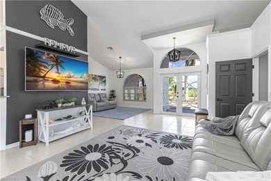 One of the BEST PRICED golf course pool homes in Royal Palm Golf on Eagle Lakes Golf Club in Florida - for sale on GolfHomes.com, golf home, golf lot